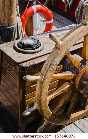 Steering wheel of an old sailing vessel, close up
