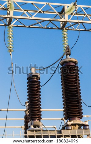 High-voltage insulators on transformer substation, close-up