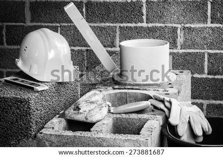 Construction of modular ceramic chimney in the house. B/W