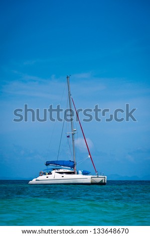 Small yacht  in the sea with blue sky at Thailand