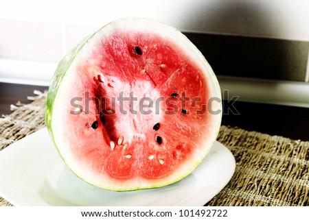 A slice of juicy water melon .