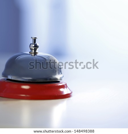 Close up photo of a bell in a hotel