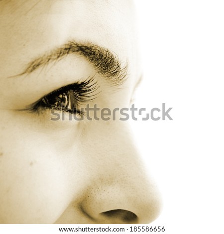 Close-up of  woman\'s green eyes.