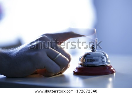 Close up photo of a bell in a hotel