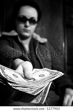 Woman with dollars in hand