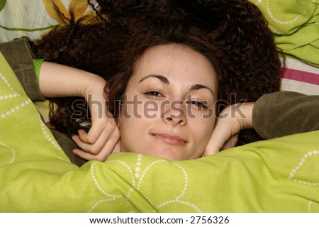 Girl stretching in bed.Good morning