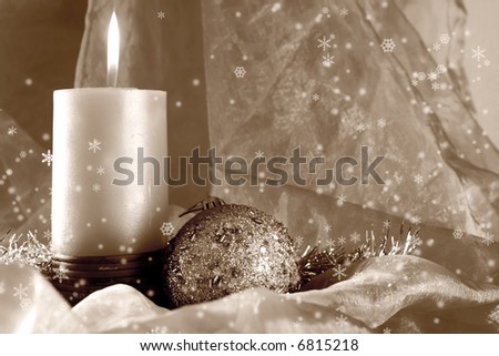 Winter ornaments: ball and candle