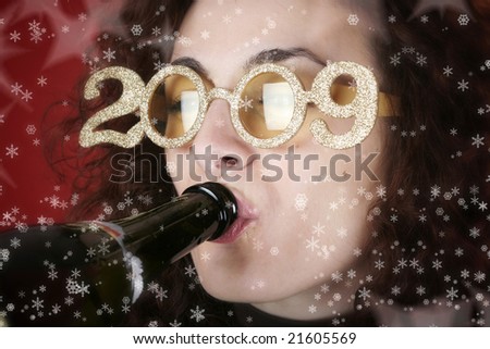 Woman celebrating new year with champagne.
