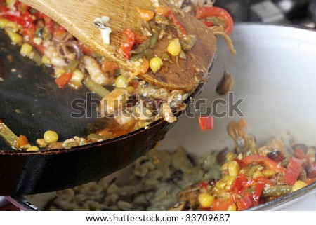Cooking mexican food with vegetables .