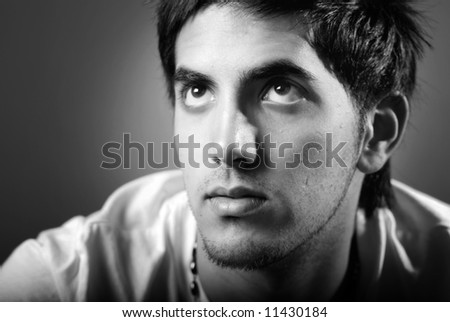 Young attractive male shot in black and white