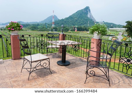 Outdoor table and chair garden furniture with nature view