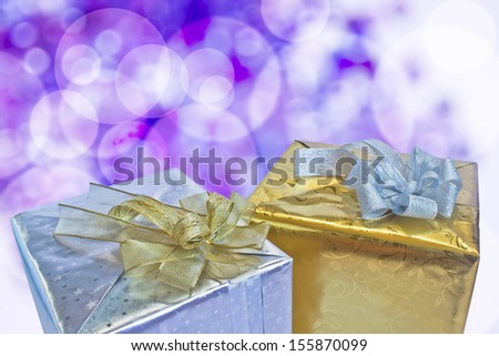 Closeup of gift boxes on abstract background