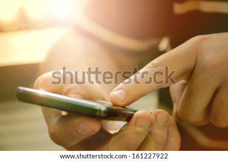 Man Using Mobile Smart Phone Outdoor