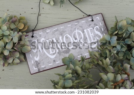 Shabby chic memories sign with autumn faded green and lilac hydrangea flowers