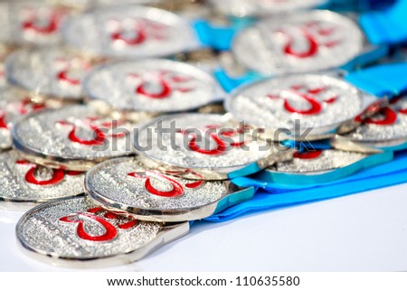 HUAHIN, THAILAND-AUG 19: Medal of the winner in Queen\'s cup HuaHin International Triathlon 2012-near Kao Tao lake on Agust 19,2012