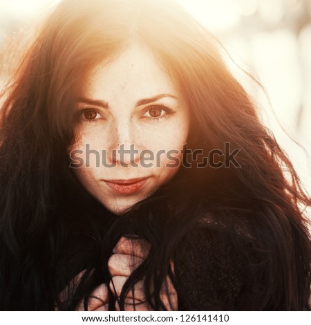 Outdoor Fashion Stunning Closeup Portrait Of Pretty Young Girl. Woman Posing In Winter Sunny Sunshine Photo.