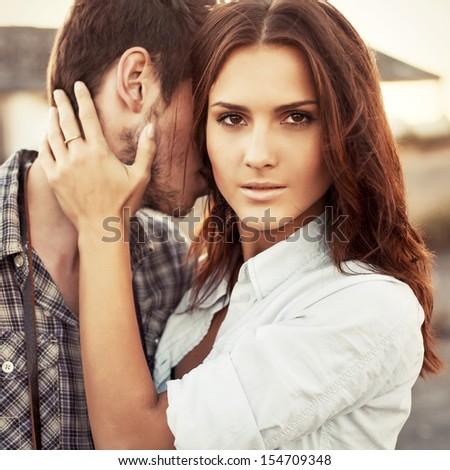 Outdoor Closeup Fashion Portrait Of Young Beautiful Brunette Woman With Handsome Strong Man In Love. Deep Look.