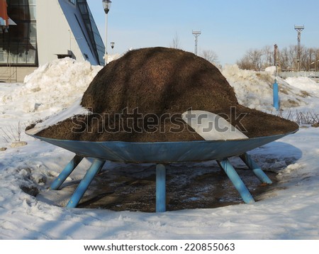 SAMARA, RUSSIA - MARCH 20: Flying saucer outside the Space Museum of Samara on March 20, 2014 in Samara, Russia.