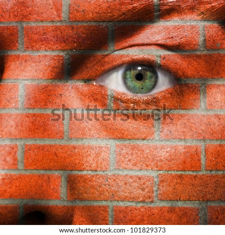 Face with green eye to portray a personality disorder or self protection by building walls around themselves. Tough on the inside, insecure and low self esteem on the outside.