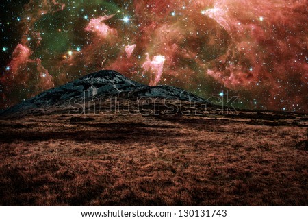 Red alien landscape with mountain in a far away galaxy - elements of this image are furnished by NASA