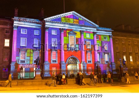 DUBLIN - OCTOBER 30: Failte Ireland works with Trinity College and the IDA to develop high impact light projections on the facade of Trinity College and Bank of Ireland on October 30, 2013 in Dublin