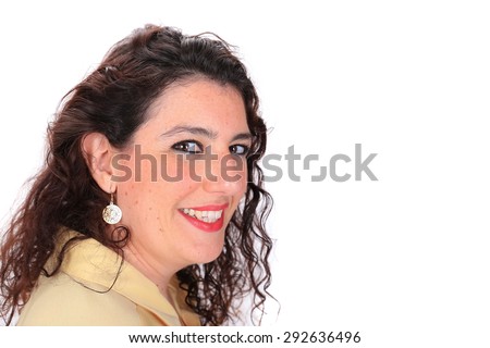 Side profile headshot of a Spanish woman with dark hair brown eyes wearing a yellow blouse