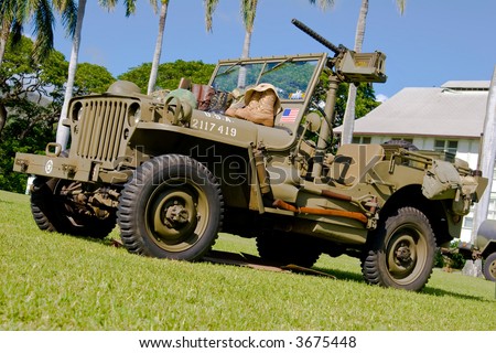 Vintage army WWII Jeep on display with fifty cal machine gun