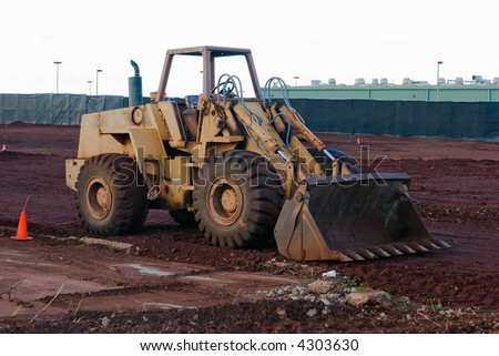 Construction loader at a job site ready to work