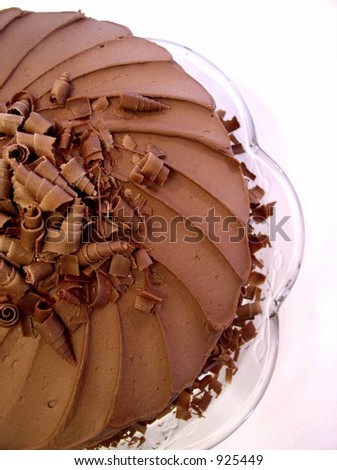 chocolate mousse cake with spiral chocolate shavings on top, top view