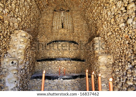 Human skulls covering inner walls of the Chapel of Bones (Portugal).