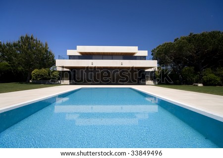 A luxury modern house with a big swimmingpool- Lifestyle concept