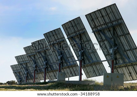 Alternative energy; Solar panels aligned and faced to the sunlight.