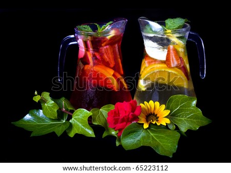 Decorated red Sangria over Black background.