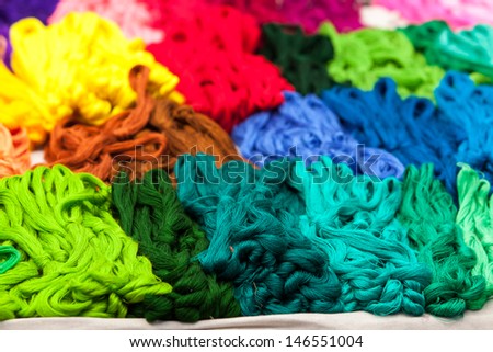Colorful skeins for sale on the market in Mexico, Latin America. Arts and crafts.