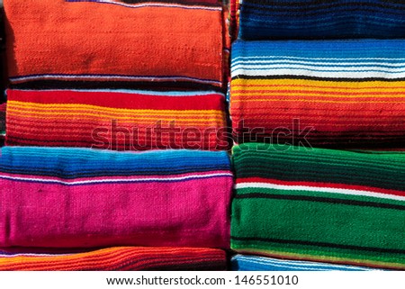 Colorful Mexican blankets for sale at market
