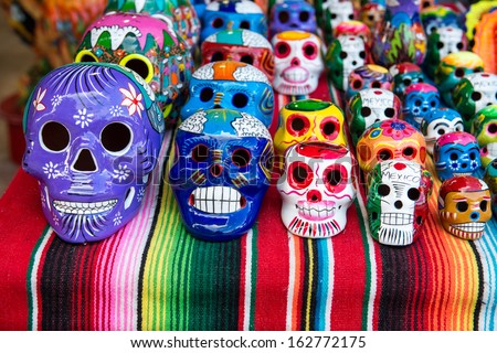 Traditional Mexican Souvenir Skulls On The Market. Travel Background For Mexico, Latin America.