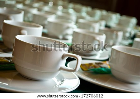 lots of coffee in cups on the table