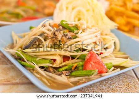 Papaya salad, Thai food, place on plate