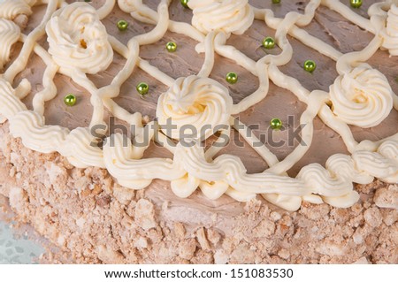 meringue cake with nuts on a plate