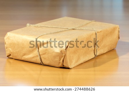 paper packaging on a wooden table