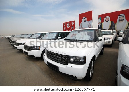 ABU DHABI, UNITED ARAB EMIRATES - APRIL 10: Prizes for camel racing April 10, 2012 in Abu Dhabi, UAE. The cars are prizes for winners of a race, the winner can choose a car out of these 4x4 cars.