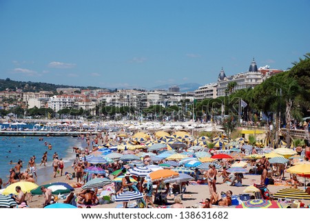 CANNES, FRANCE - JULY 23: The beach in Cannes July 23, 2008 in Cannes, France. The famous beach on the croisette, known for its filmfestival in may.