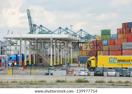 ANTWERP, BELGIUM - AUGUST 8: Loading and unloading of container-ships August 8, 2010 in Antwerp, Belgium. These photos are taken on the MSC Home terminal, one of the biggest terminals in the port