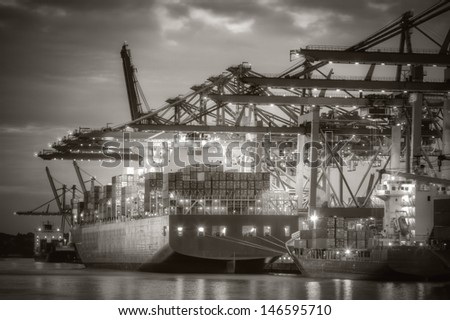 Container ship in the harbor of Hamburg. Black and White.
