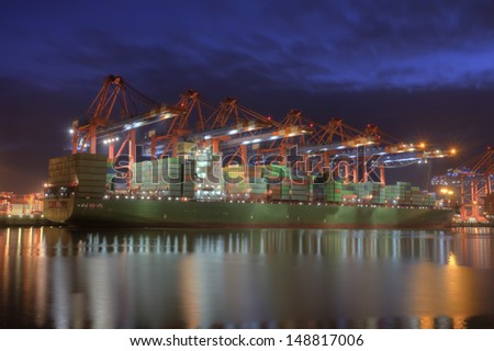 Container Terminal in Hamburg, Germany - during winter.