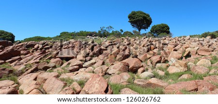 Panorama of the Rocky landscape at Gannet Rock  and rocky beach  near Meelup in Geographe Bay  south western Australia on hot summer day.