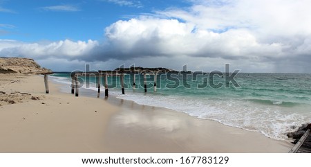 Panorama of the isolated  beach at remote  Hamelin Bay  a popular fishing location in south western Australia in early autumn after a shower of rain .