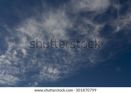 High white  wispy cirrus clouds  in  a blue Australian winter  sky  sometimes called mare\'s tails   blown by high winds into long streamers indicate fine weather    but  stormy changes coming.