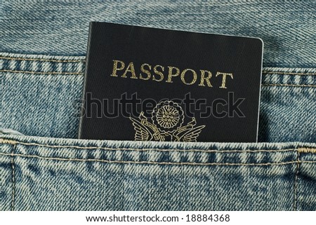 American passport coming out of jeans pocket. See more passport photos in my portfolio.
