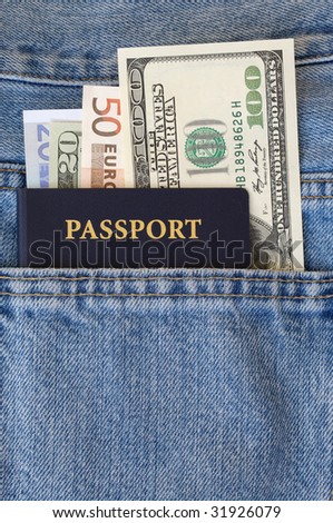American passport with dollars and euros in jeans pocket